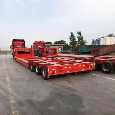 Transport Schwerlastgeräte mit 100 Tonnen Hydraulikrampen Niederbett Lkw Halbanhänger
